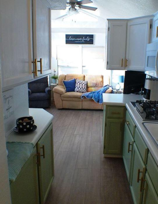 84136 Ave 44, Unit 602 Indio, CA 92203 - Photo 21 of 43 a living room with furniture and a flat screen tv