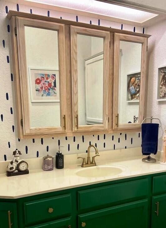 84136 Ave 44, Unit 602 Indio, CA 92203 - Photo 23 of 43 a bathroom with a sink and a mirror