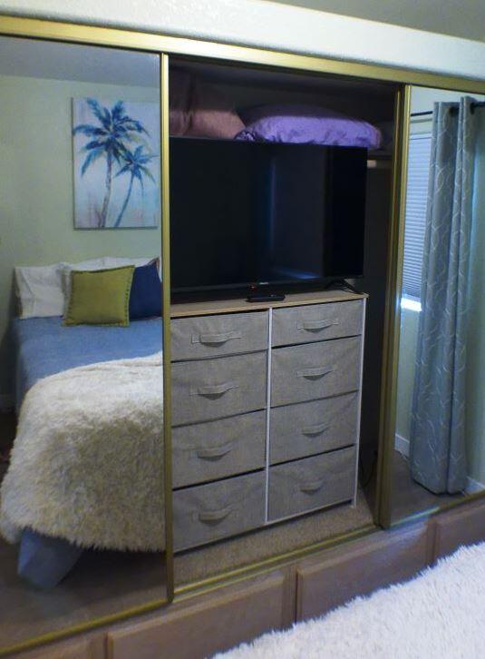 84136 Ave 44, Unit 602 Indio, CA 92203 - Photo 32 of 43 a living room with furniture and a fireplace