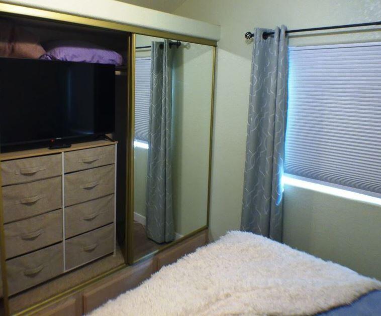 84136 Ave 44, Unit 602 Indio, CA 92203 - Photo 33 of 43 a bathroom with a shower and a sink