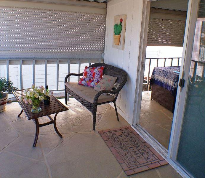 84136 Ave 44, Unit 602 Indio, CA 92203 - Photo 36 of 43 a living room with furniture and a rug