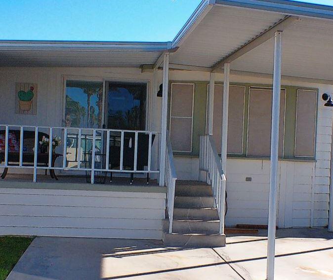84136 Ave 44, Unit 602 Indio, CA 92203 - Photo 4 of 43 a view of entrance gate of the house