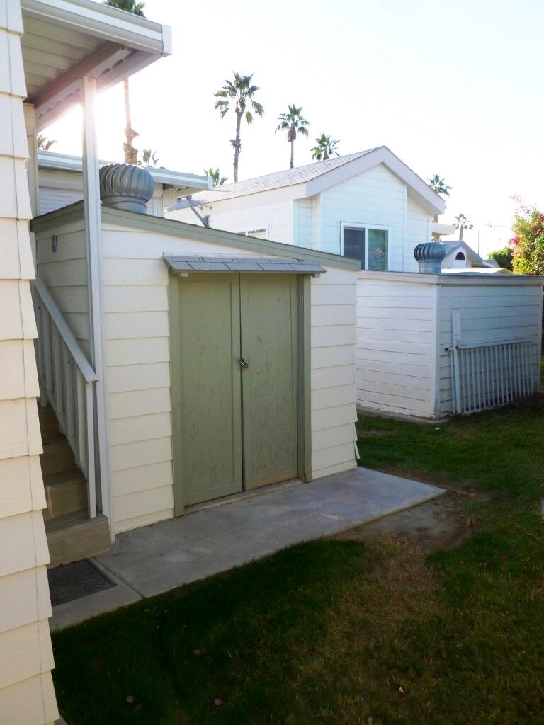 84136 Ave 44, Unit 602 Indio, CA 92203 - Photo 43 of 43 a view of a house with a yard