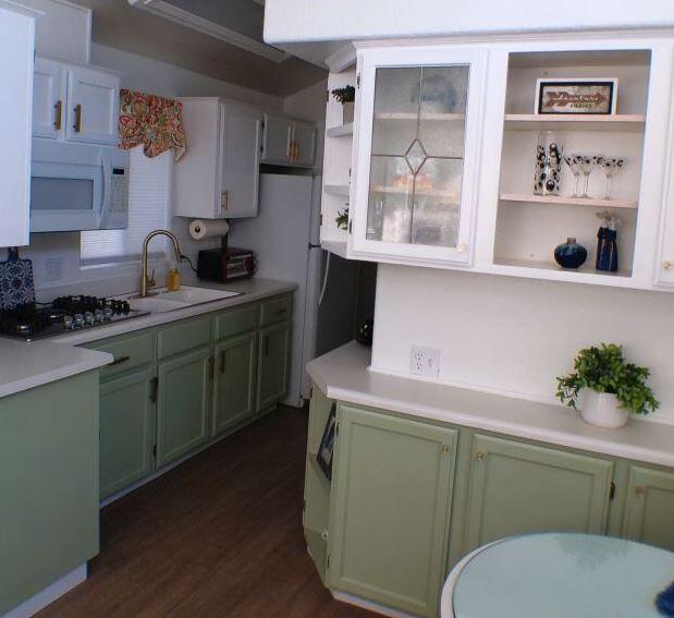 84136 Ave 44, Unit 602 Indio, CA 92203 - Photo 9 of 43 a kitchen with a cabinets and window