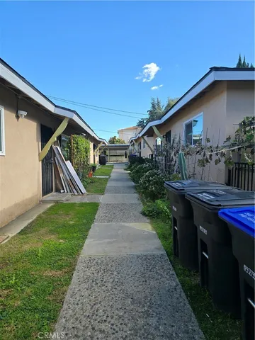a front view of house along with green space