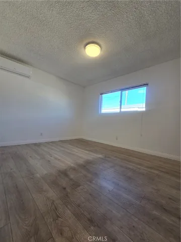 a bathroom with a toilet a sink and shower
