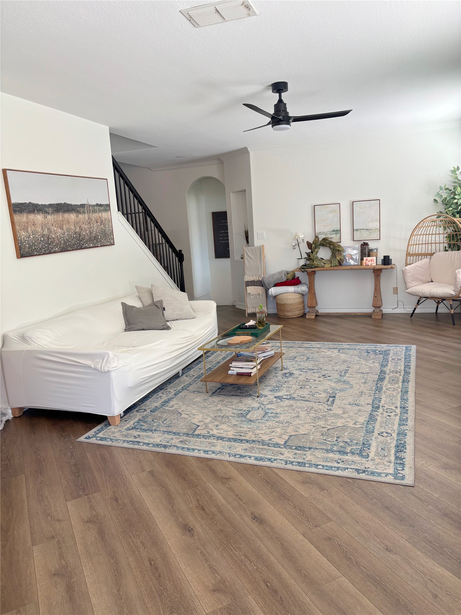 3336 Ashleys Way Marion, TX 78124 - Photo 14 of 15 Living area featuring wood finished floors, plenty of natural light, and an open floor plan