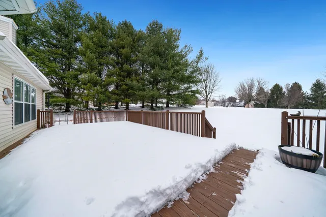 a view of a house with sitting area and furniture