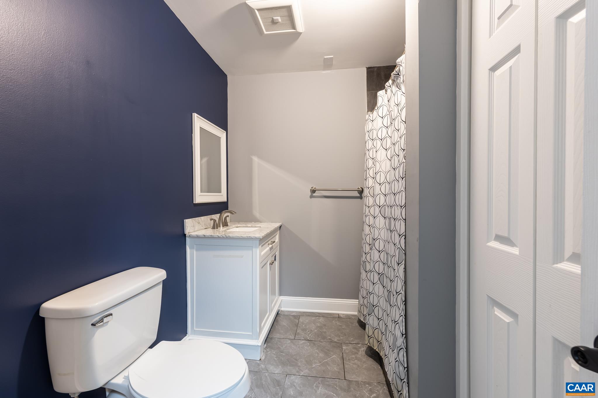 35 Brougham Road Palmyra, VA 22963 - Photo 18 of 27 a bathroom with a toilet a sink and a shower