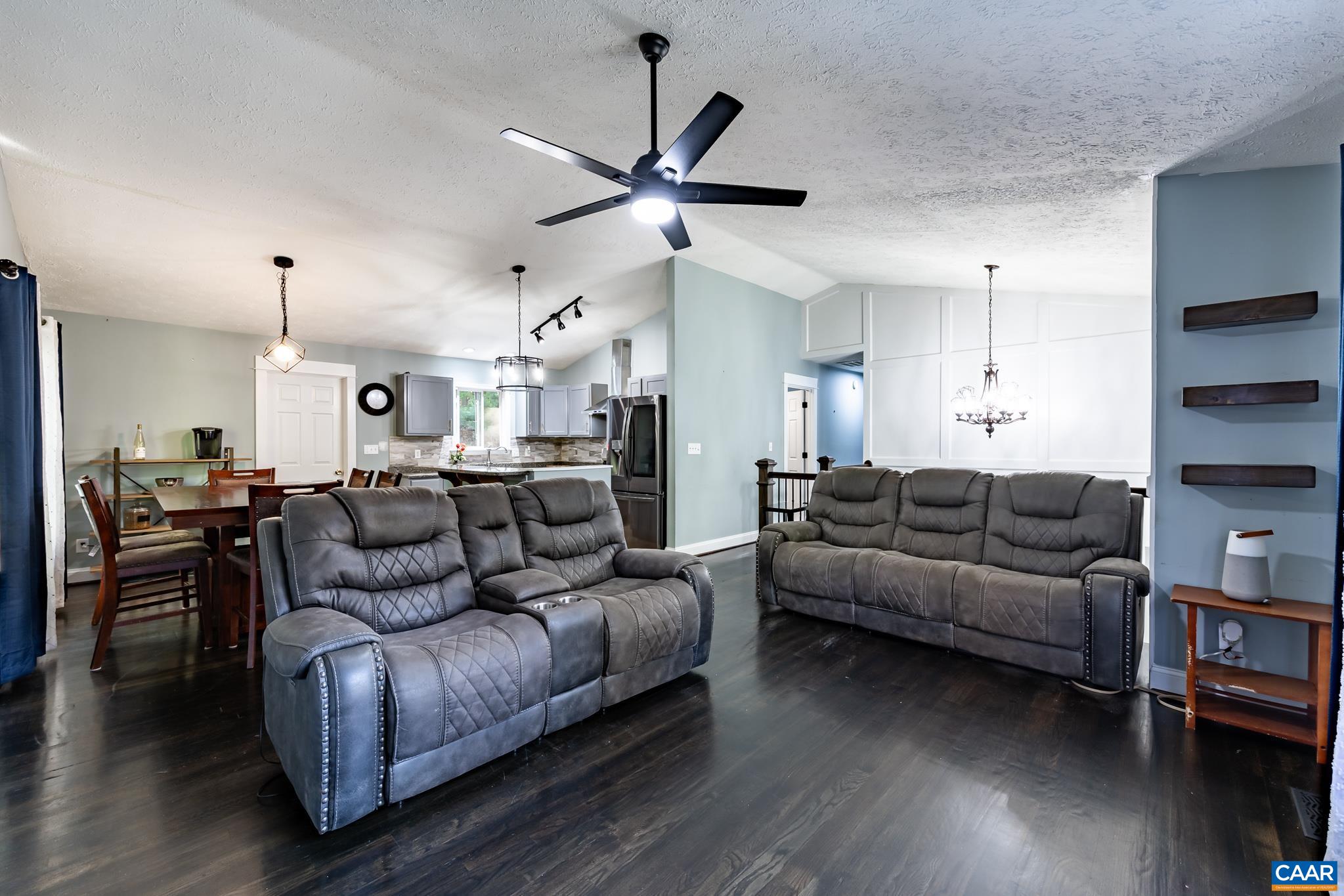 35 Brougham Road Palmyra, VA 22963 - Photo 5 of 27 a living room with furniture kitchen view and a wooden floor