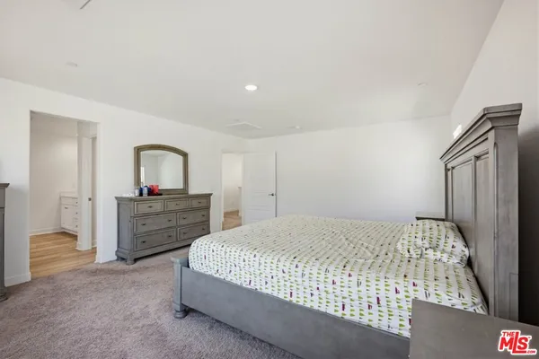 a bathroom with a sink and shower