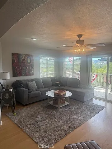 a bedroom with a bed and a large mirror