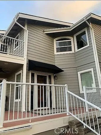 a view of a house with a deck