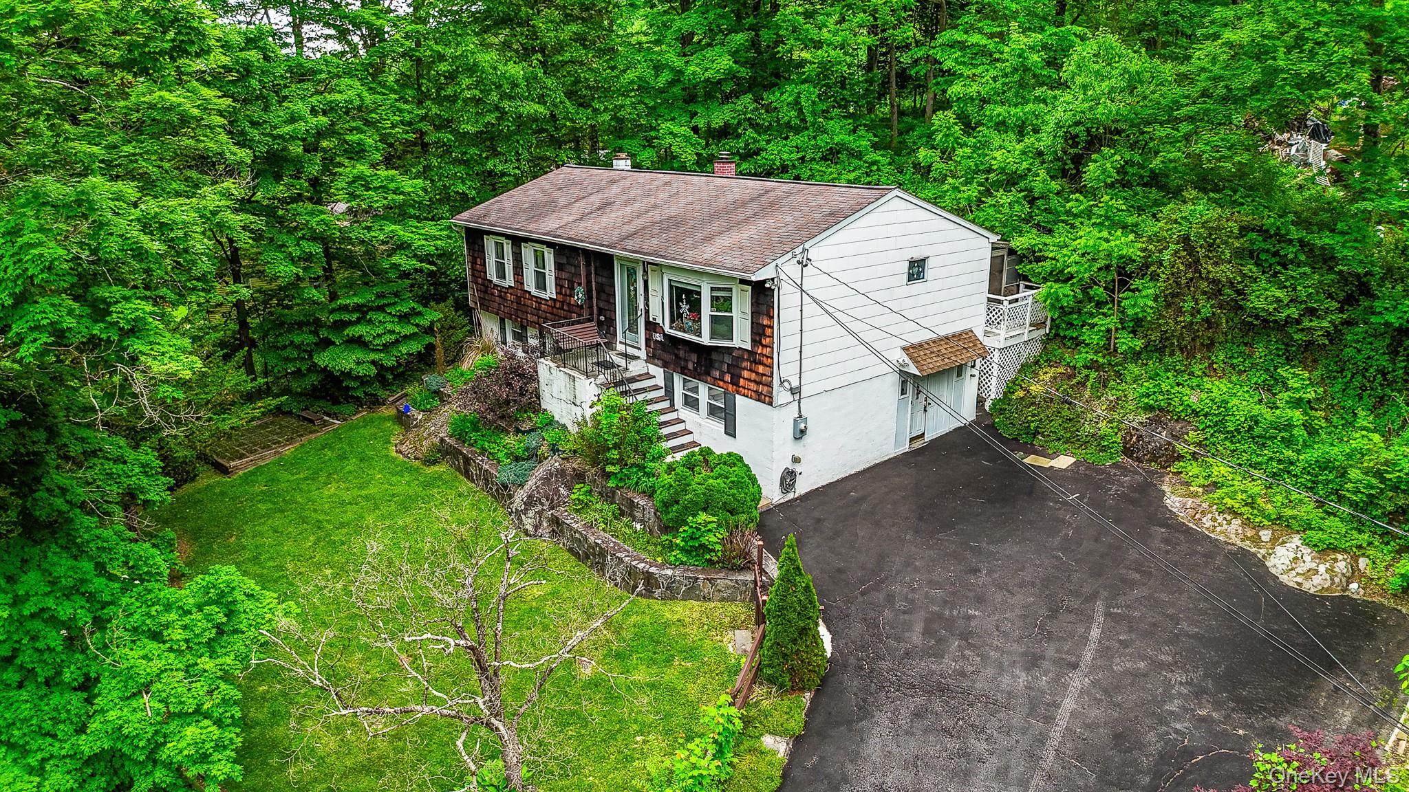 36 Rochambeau Road Garrison, NY 10524 - Photo 5 of 39 plenty of parking in the driveway