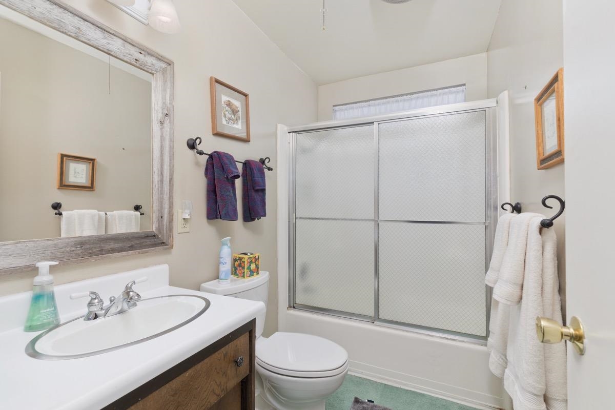 44 Tyrol Lane, Unit 209 Mammoth Lakes, CA 93546 - Photo 16 of 31 a bathroom with a sink vanity mirror and toilet