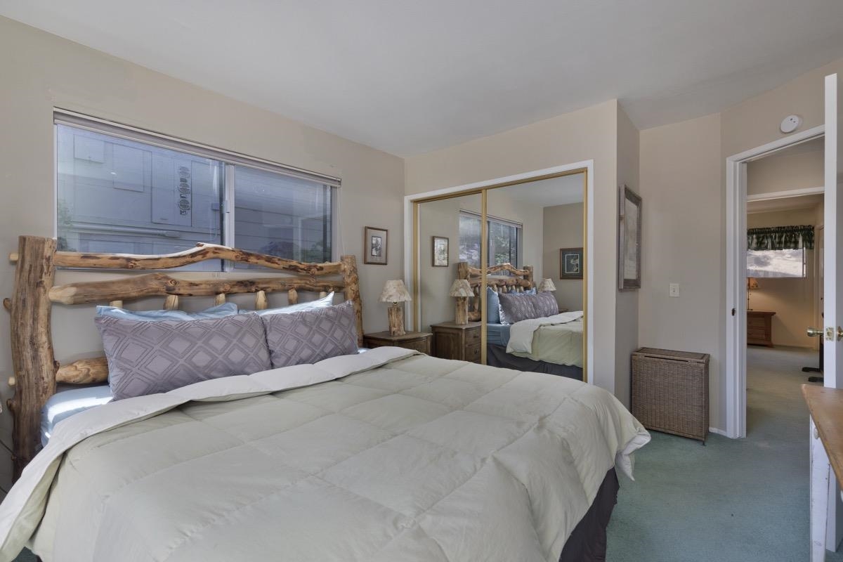 44 Tyrol Lane, Unit 209 Mammoth Lakes, CA 93546 - Photo 17 of 31 a bedroom with a bed and closet