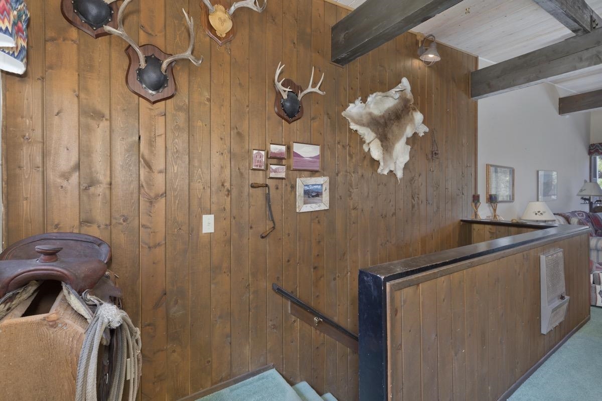 44 Tyrol Lane, Unit 209 Mammoth Lakes, CA 93546 - Photo 22 of 31 a bathroom with a sink mirror and a shower