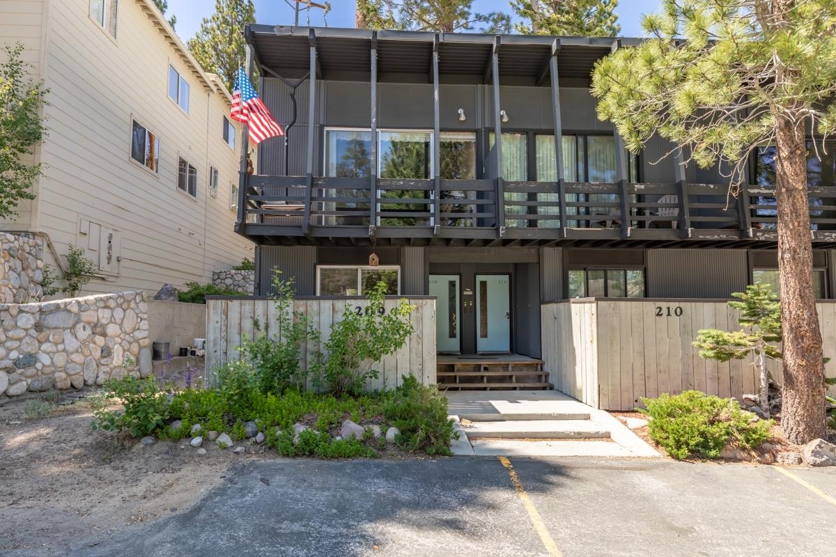 44 Tyrol Lane, Unit 209 Mammoth Lakes, CA 93546 - Photo 24 of 31 a front view of a house with a garden