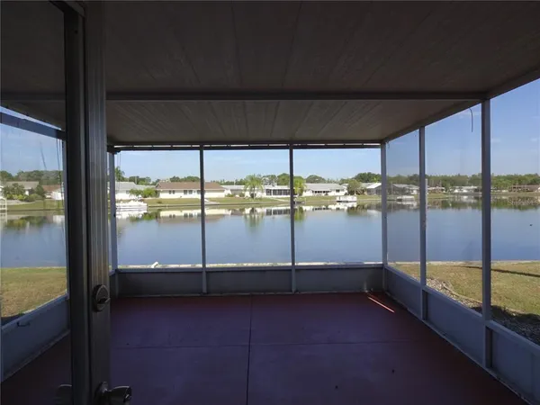 a view of a back yard from a balcony