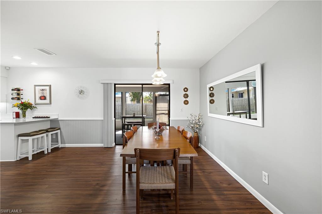 18517 Sebring Road Fort Myers, FL 33967 - Photo 15 of 32 a living room with furniture and a wooden floor