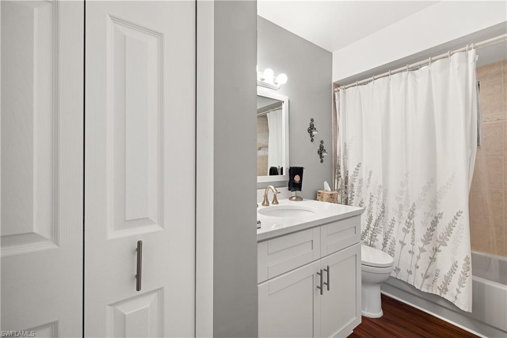 18517 Sebring Road Fort Myers, FL 33967 - Photo 20 of 32 a bathroom with a sink a toilet and shower