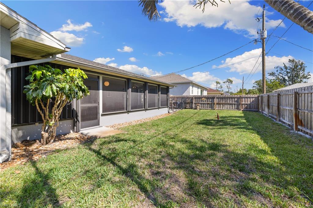 18517 Sebring Road Fort Myers, FL 33967 - Photo 25 of 32 a house view with a backyard space