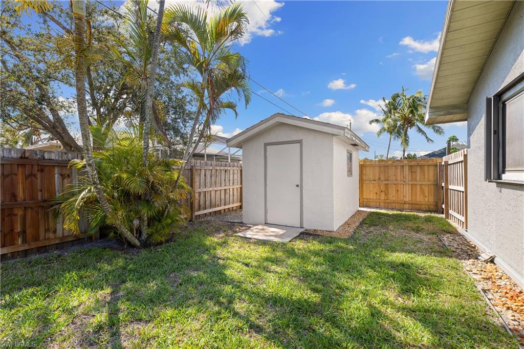 18517 Sebring Road Fort Myers, FL 33967 - Photo 26 of 32 a view of a house with a yard