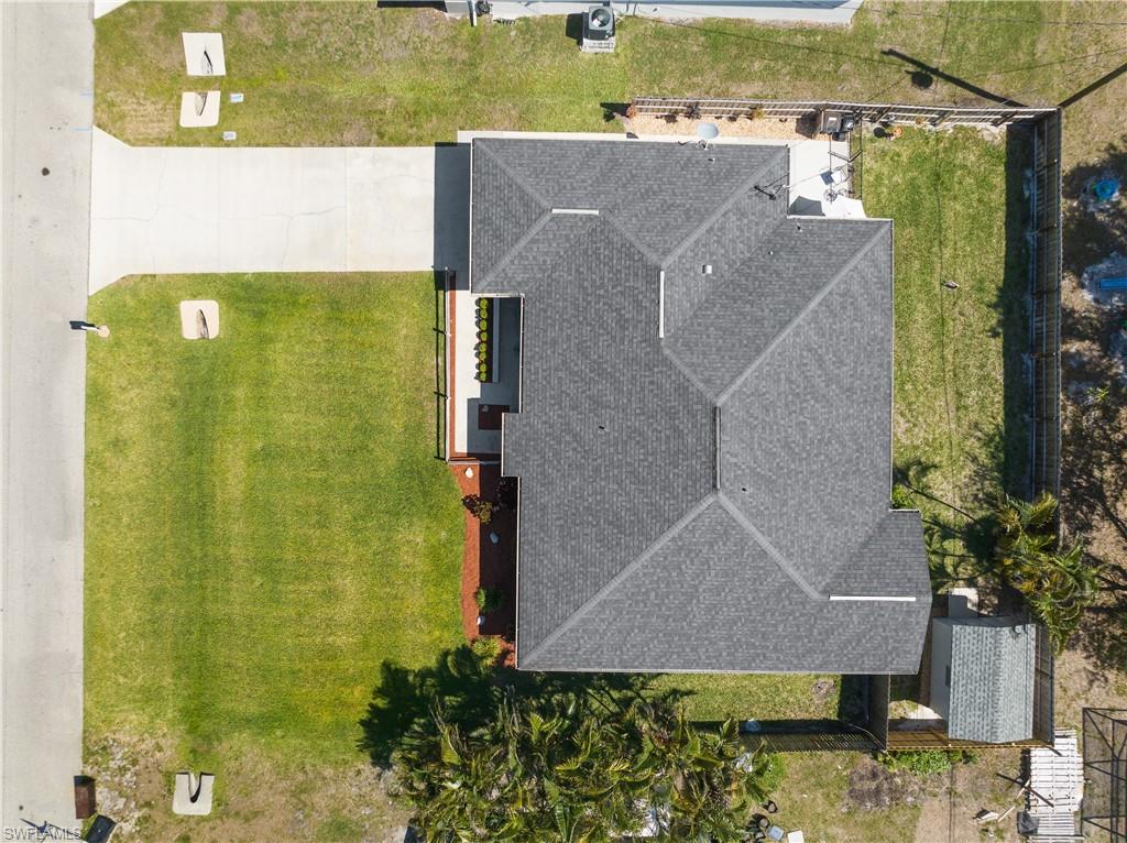 18517 Sebring Road Fort Myers, FL 33967 - Photo 5 of 32 an aerial view of residential house with pool and yard