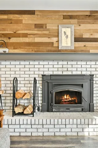 a fireplace with a wooden floor