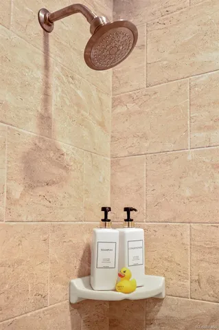 a bathroom with a light fixture and a sink