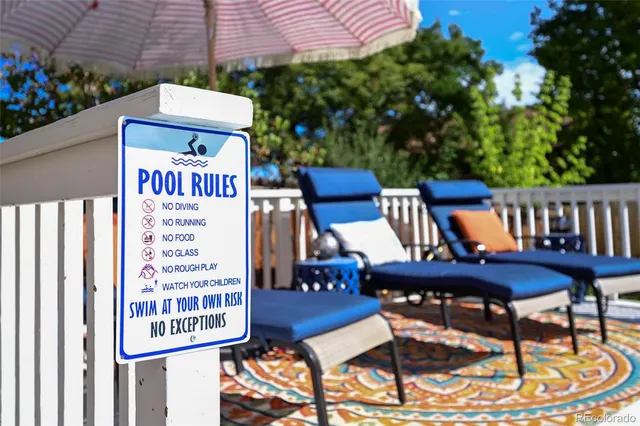 a patio with table and chairs