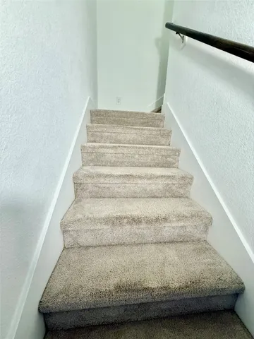 a view of hallway with closet