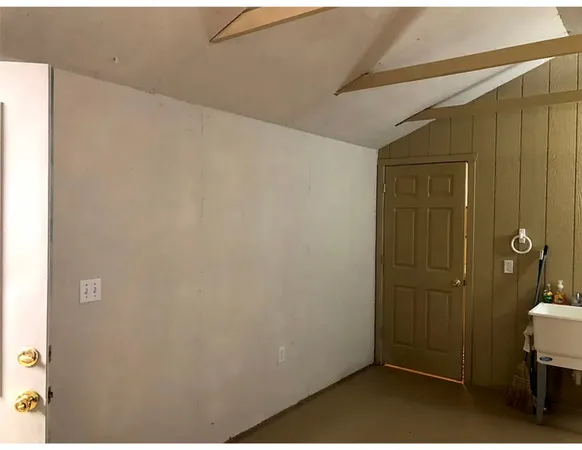 a kitchen with a stove and a refrigerator