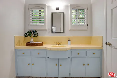 a bathroom with a sink and a bathtub