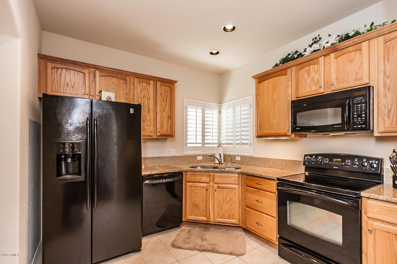 3935 East Rough Rider Road, Unit 1195 Phoenix, AZ 85050 - Photo 1 of 35 Kitchen