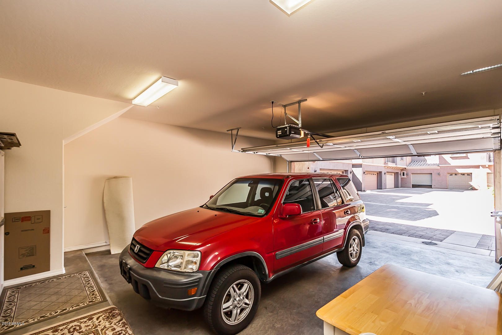 3935 East Rough Rider Road, Unit 1195 Phoenix, AZ 85050 - Photo 14 of 35 Garage