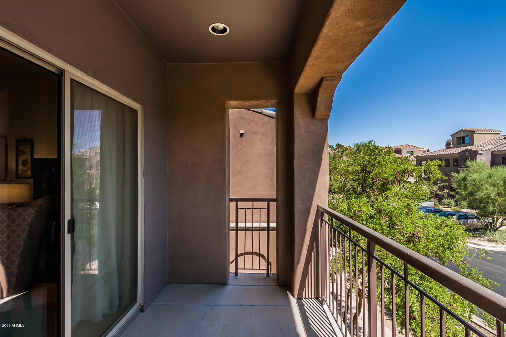 3935 East Rough Rider Road, Unit 1195 Phoenix, AZ 85050 - Photo 5 of 35 Interior facing balcony