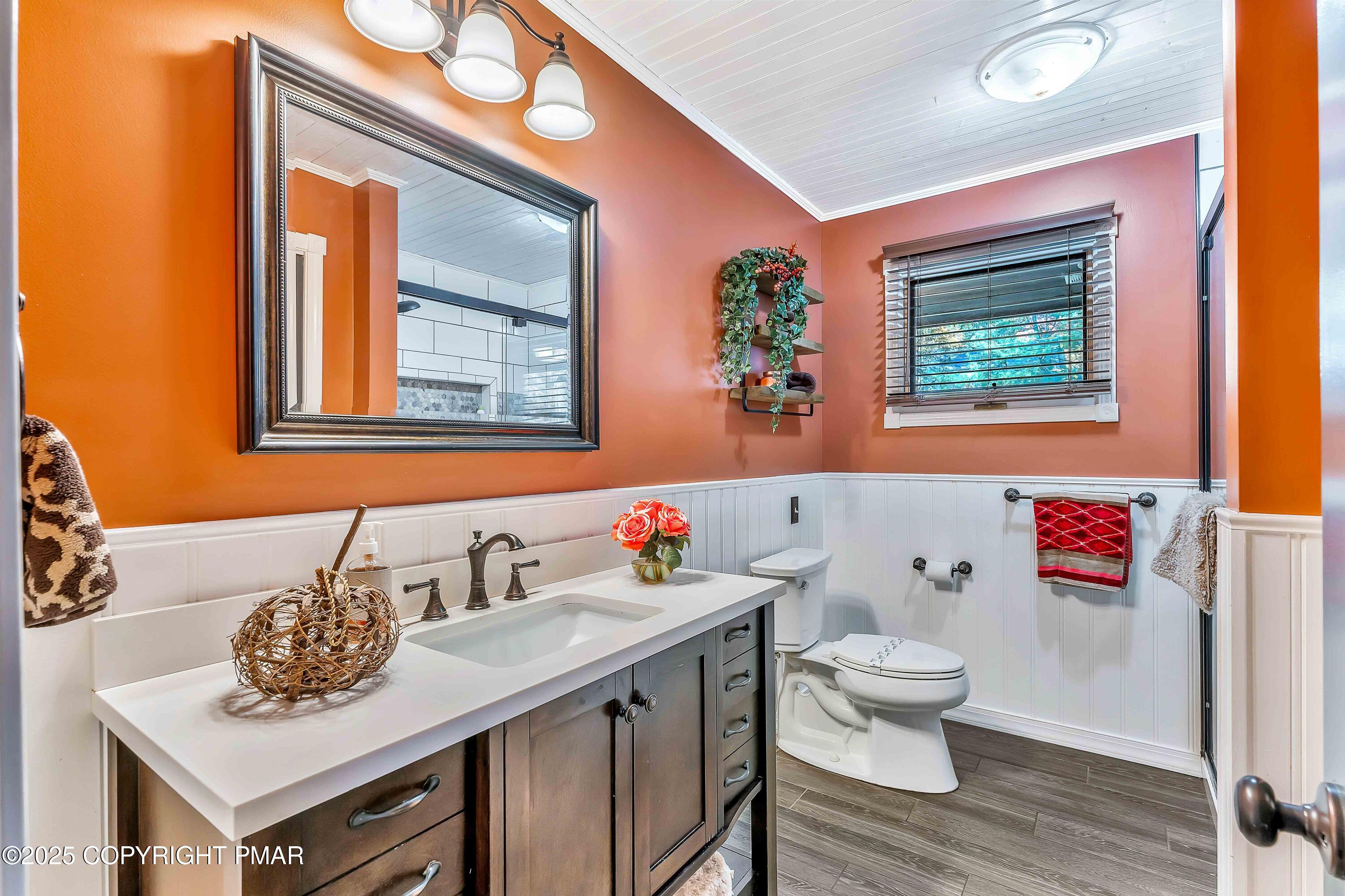 4193 Forest Drive Kunkletown, PA 18058 - Photo 22 of 33 a bathroom with a sink a toilet and a large mirror