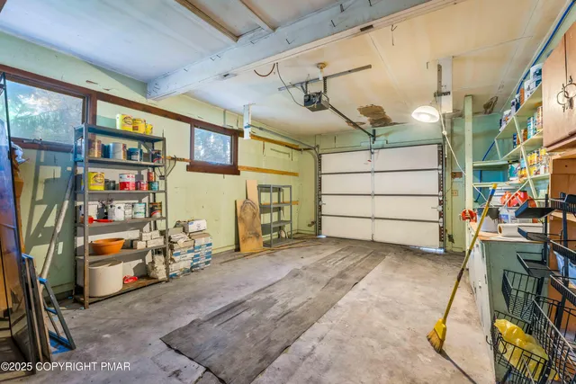 a view of a pathway of a house with backyard