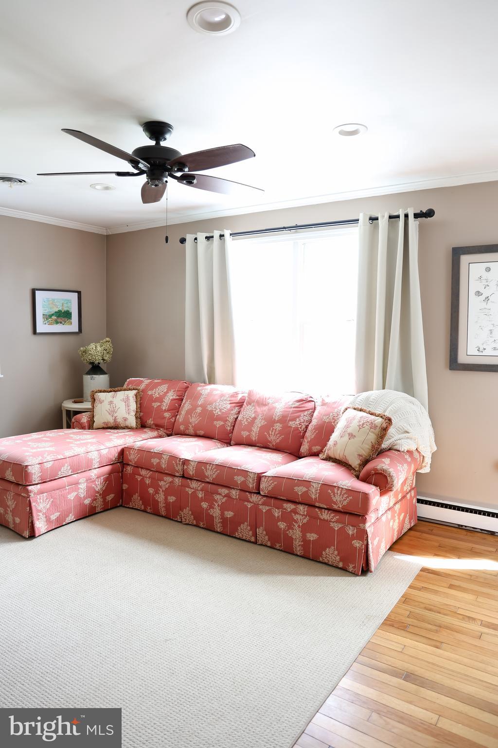 2353 Shuresville Road Darlington, MD 21034 - Photo 12 of 25 a living room with a bed furniture and a window