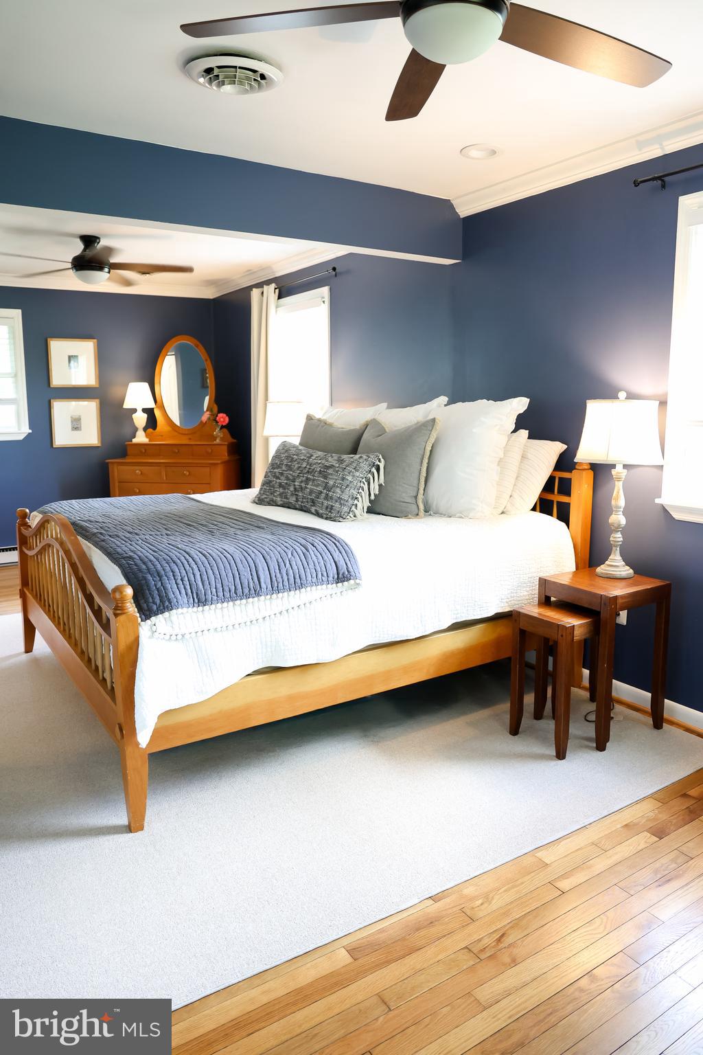 2353 Shuresville Road Darlington, MD 21034 - Photo 16 of 25 a bedroom with a bed and wooden floor