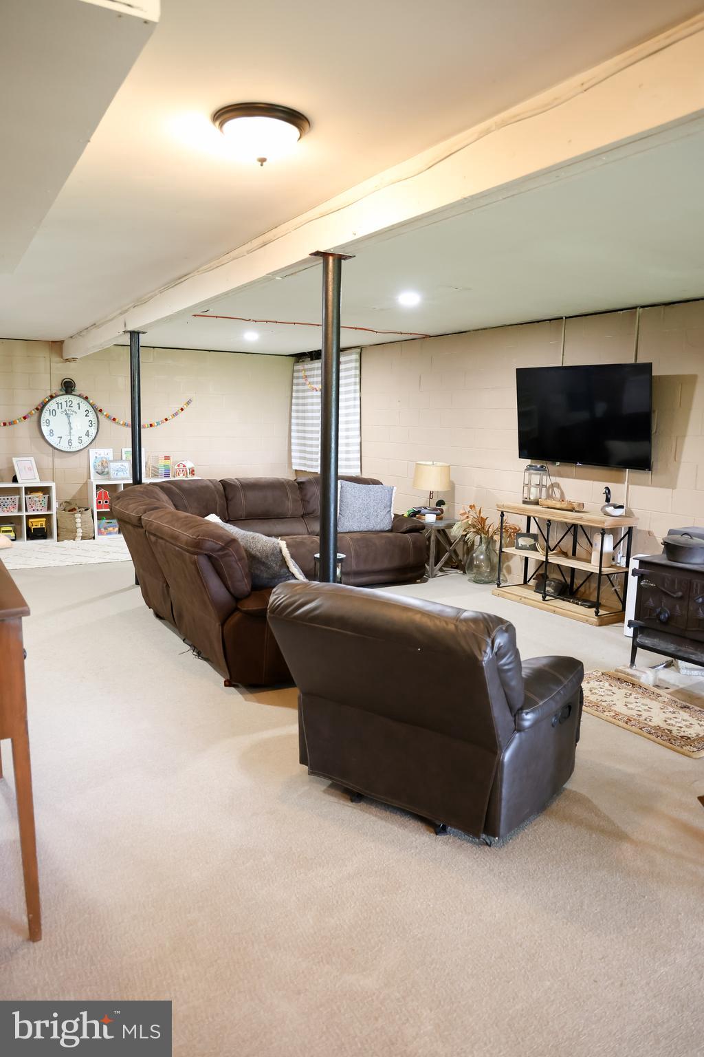 2353 Shuresville Road Darlington, MD 21034 - Photo 19 of 25 a living room with furniture and a flat screen tv