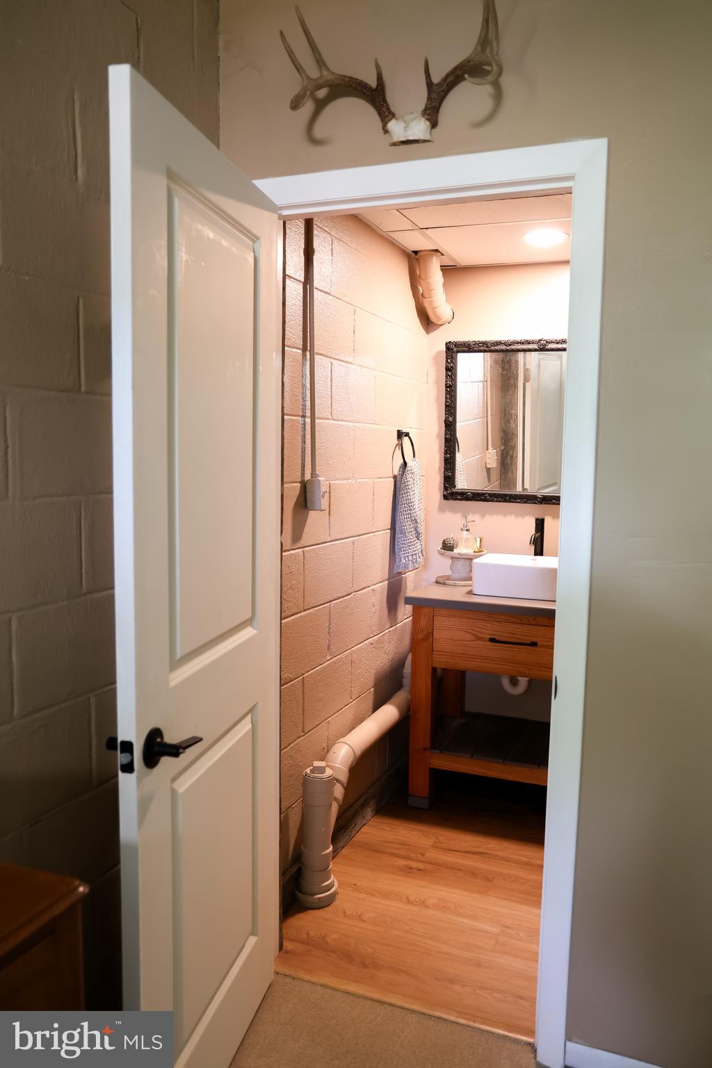 2353 Shuresville Road Darlington, MD 21034 - Photo 21 of 25 a bathroom with a sink and a mirror