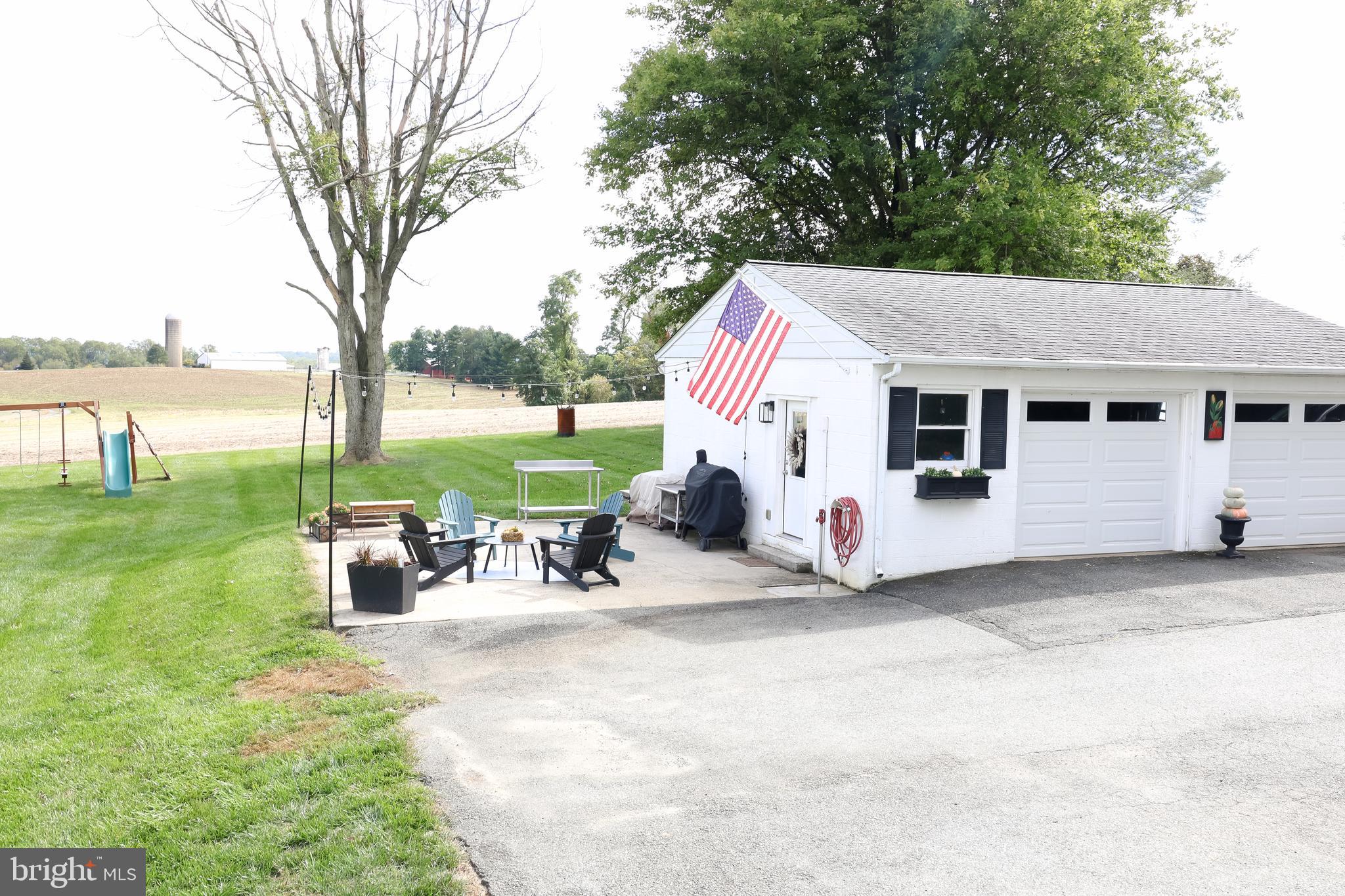 2353 Shuresville Road Darlington, MD 21034 - Photo 23 of 25 a view of a house with backyard and a tree