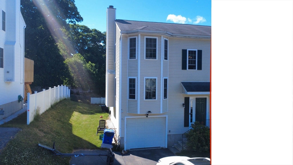 74 Sophia Drive Worcester, MA 01607 - Photo 1 of 15 a view of a house with a yard