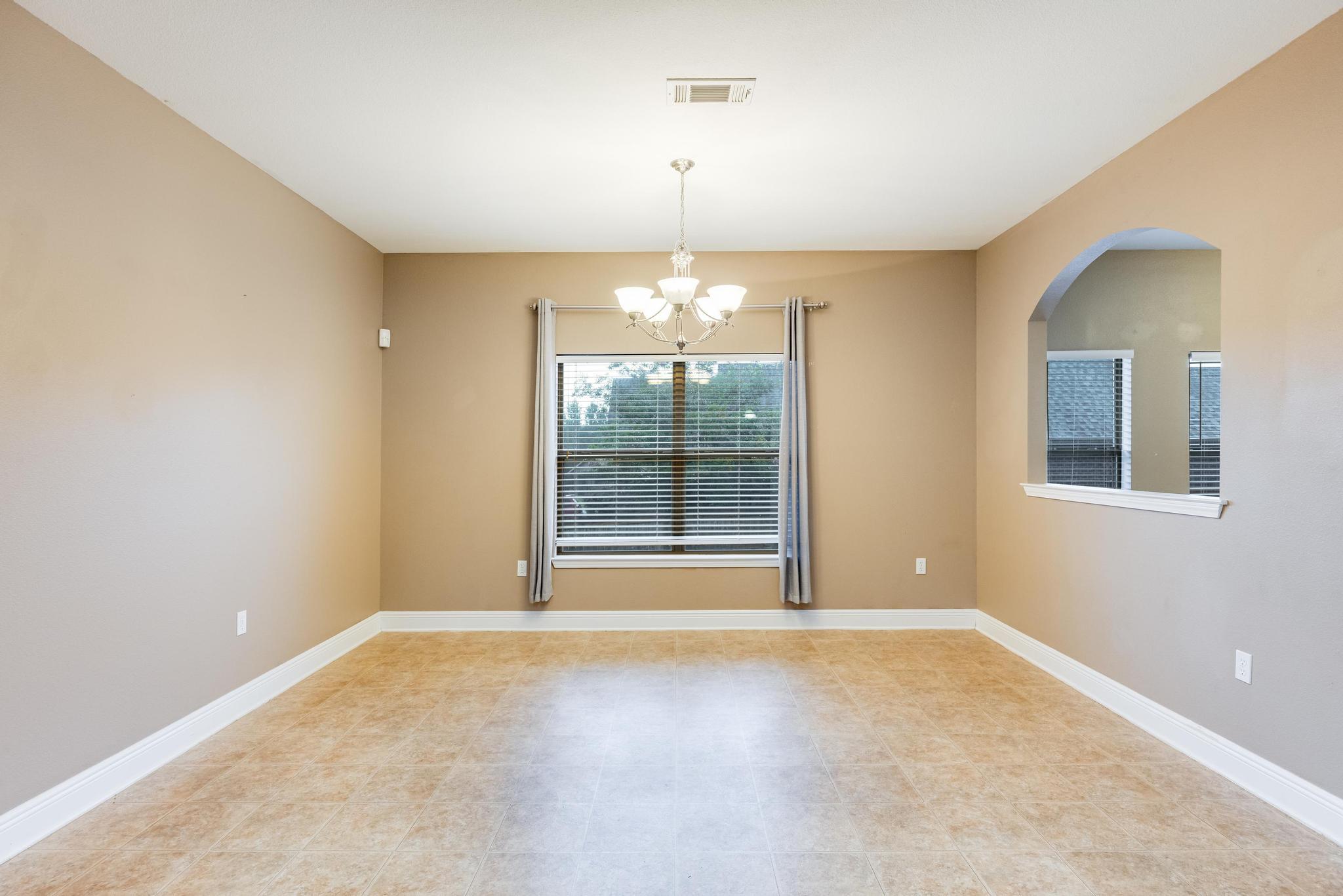 750 Lime Lane Crestview, FL 32536 - Photo 13 of 51 a view of an empty room with a window