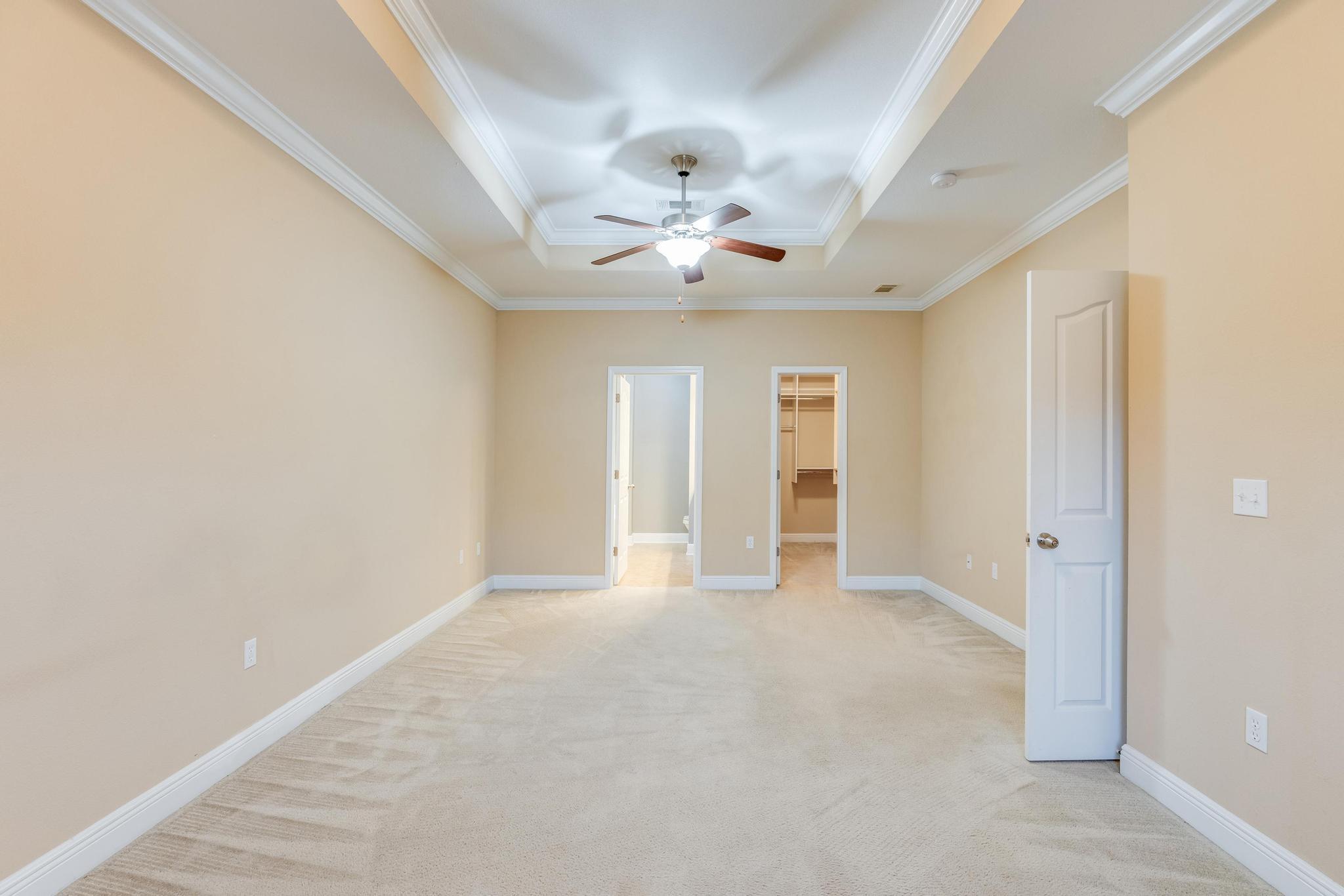 750 Lime Lane Crestview, FL 32536 - Photo 25 of 51 an empty room with a ceiling fan and a window