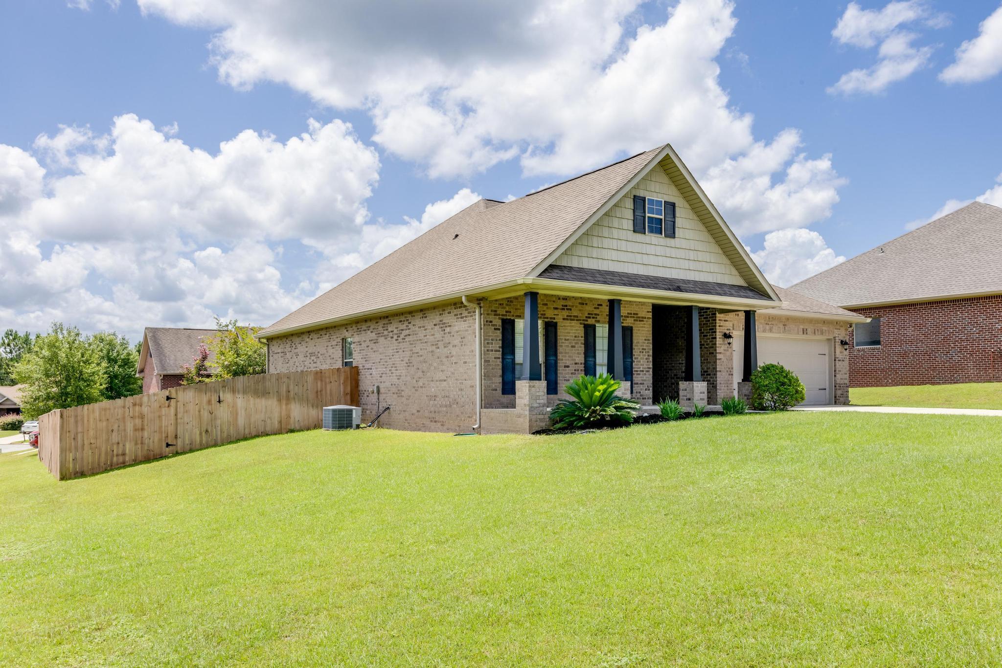 750 Lime Lane Crestview, FL 32536 - Photo 3 of 51 a front view of house with yard and green space