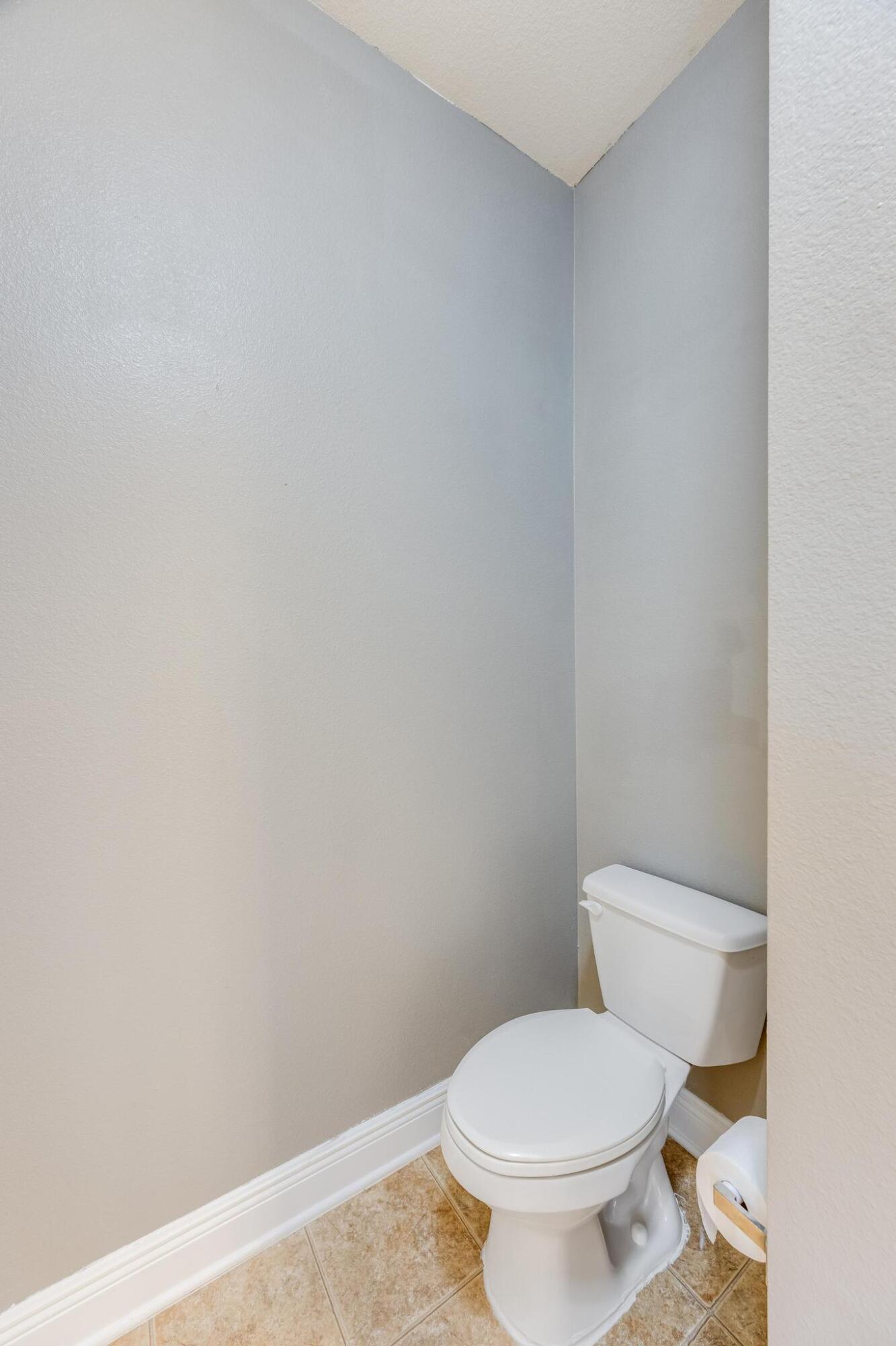 750 Lime Lane Crestview, FL 32536 - Photo 31 of 51 a white toilet sitting next to a white wall
