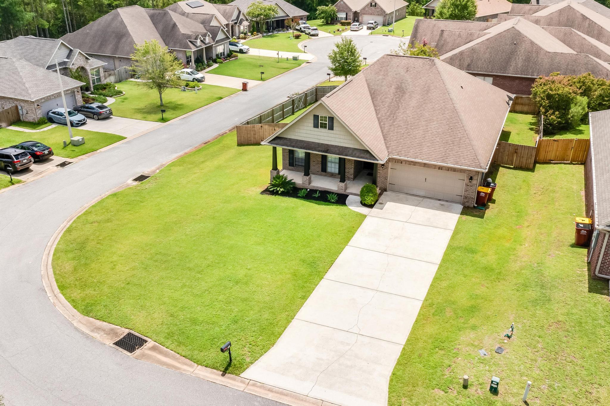 750 Lime Lane Crestview, FL 32536 - Photo 45 of 51 an aerial view of a house with swimming pool